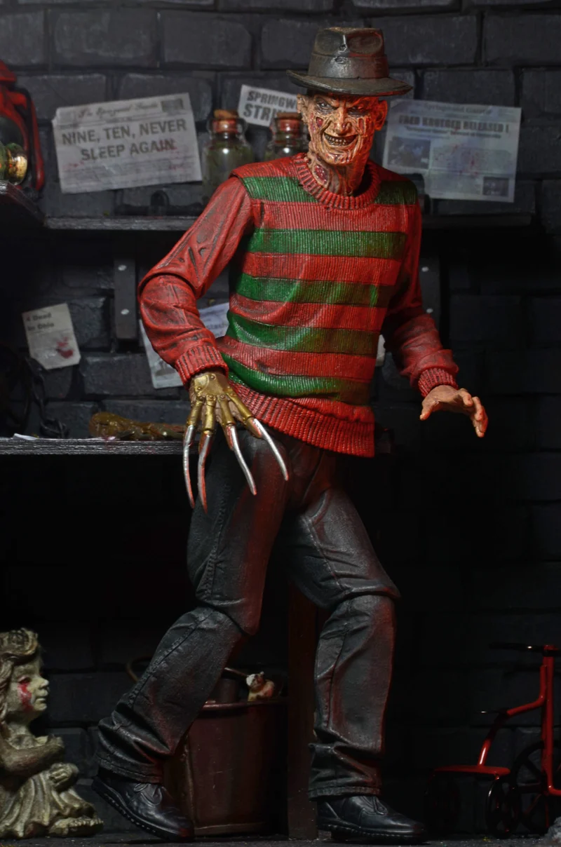 NECA Figura de Accion Ultimate: Pesadilla En La Calle Del Infierno 30 Aniversario - Freddy 7 Pulgadas