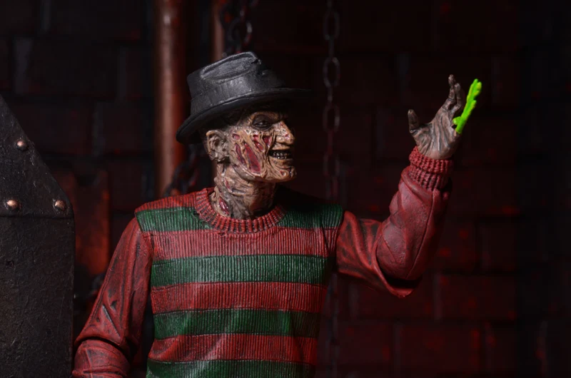 NECA Figura de Accion Ultimate: Pesadilla En La Calle Del Infierno 30 Aniversario - Freddy 7 Pulgadas