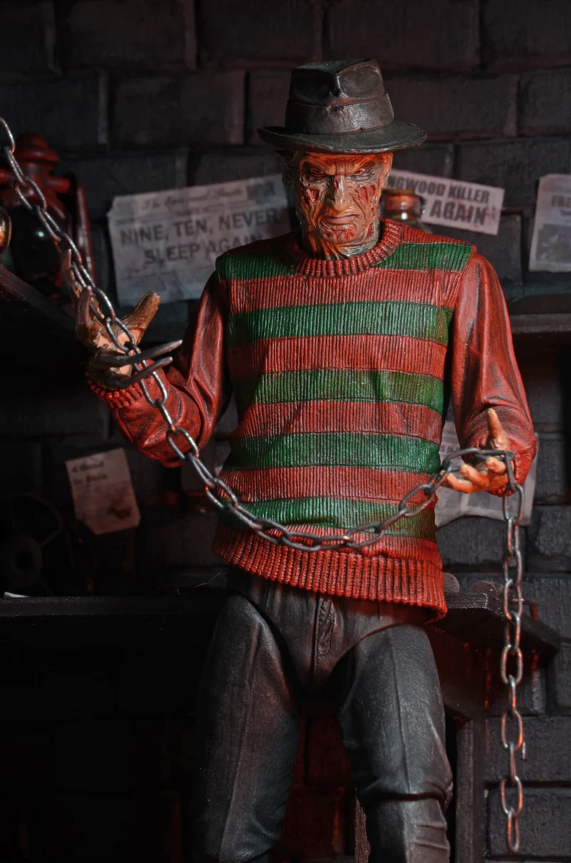 NECA Figura de Accion Ultimate: Pesadilla En La Calle Del Infierno 30 Aniversario - Freddy 7 Pulgadas