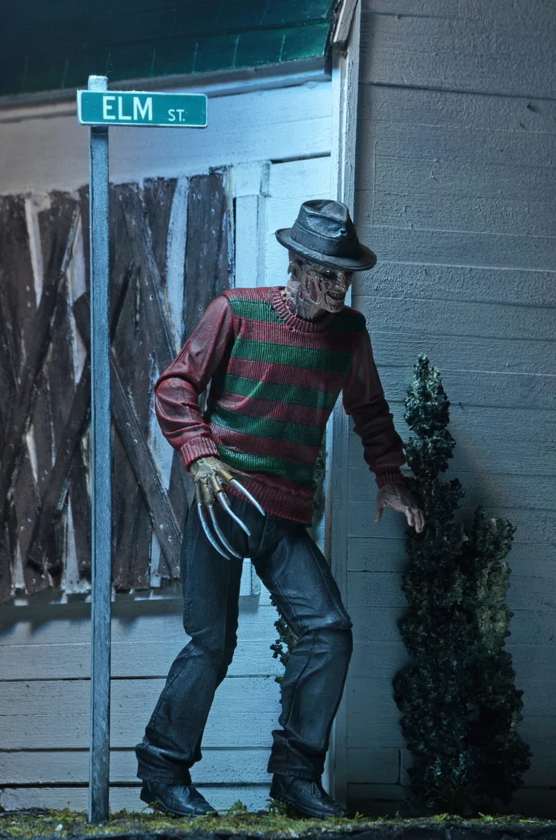 NECA Figura de Accion Ultimate: Pesadilla En La Calle Del Infierno 30 Aniversario - Freddy 7 Pulgadas