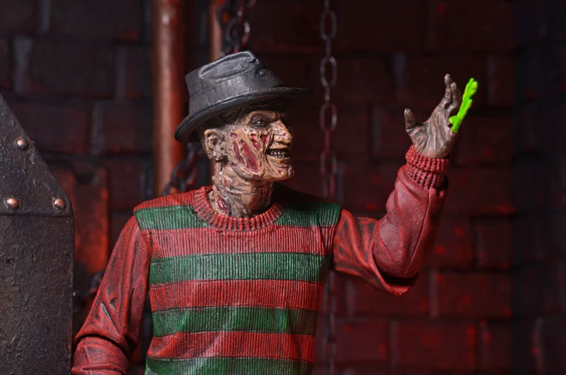 NECA Figura de Accion Ultimate: Pesadilla En La Calle Del Infierno 30 Aniversario - Freddy 7 Pulgadas