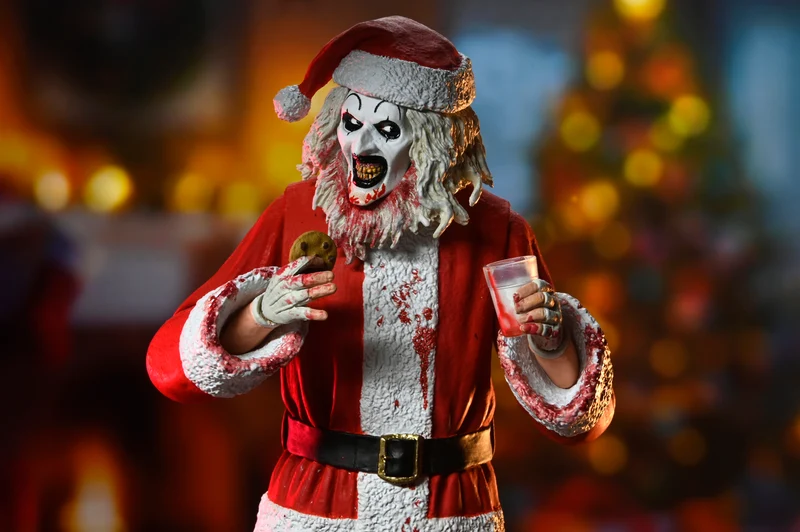 NECA Figura de Accion Ultimate: Terrifier 3 - Santa Suit Art the Clown Bloody Version 7 Pulgadas