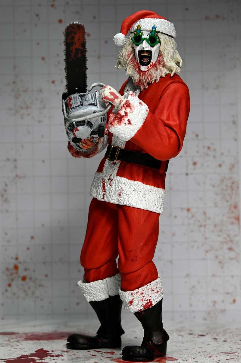 NECA Figura de Accion Ultimate: Terrifier 3 - Santa Suit Art the Clown Bloody Version 7 Pulgadas