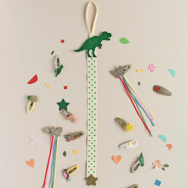Colgador Clips Pelo · T Rex