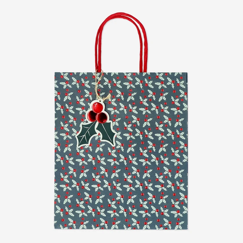 Gift bag with debossed holly pattern