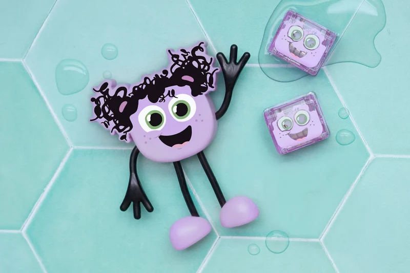 GloPals Set Personaje + 2 Cubos luz LUMI Lila