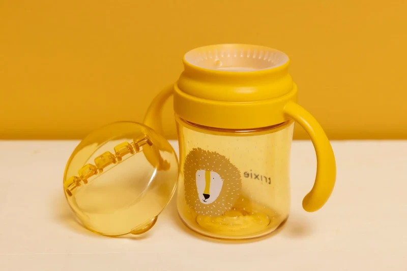 Taza 360º con asas Mr. Lion · Trixie