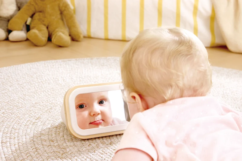 Tambor giratorio con espejo · Hape