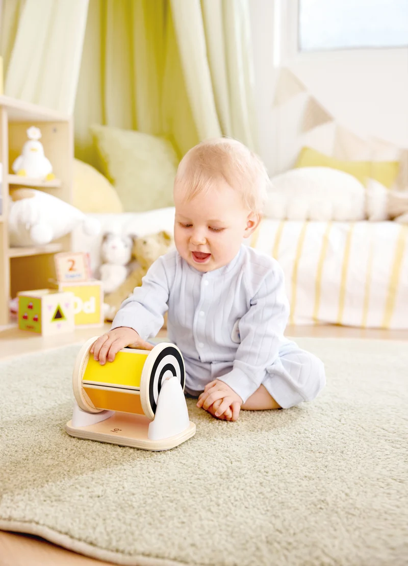 Tambor giratorio con espejo · Hape