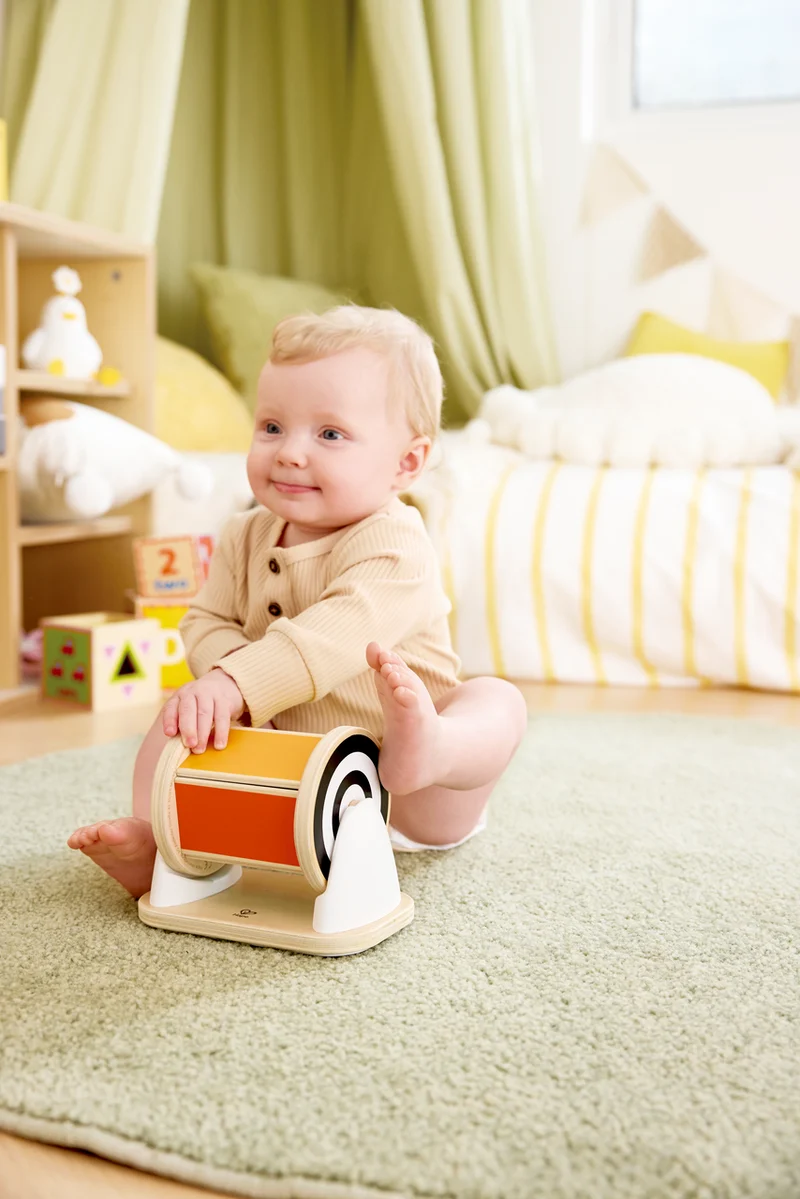 Tambor giratorio con espejo · Hape