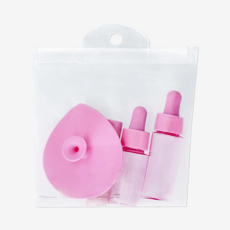 Pink travel set with dropper bottles - 4 pcs