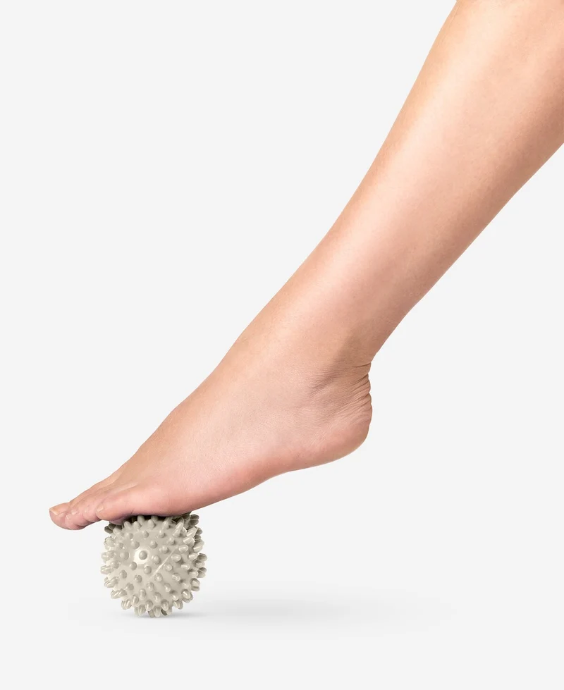 Grey massage roller with spikes