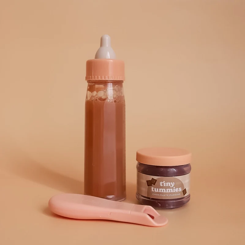Biberon Mágico y Tiny Potito Chocolate con cuchara para muñecos · Tiny Harlow