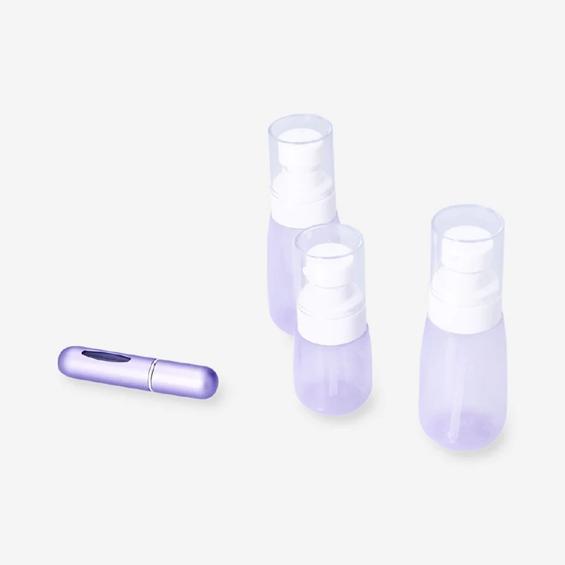 Purple travel set with perfume bottle