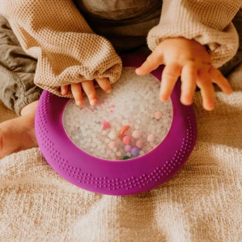Bolsa Sensorial Peekaboo · Jellystone