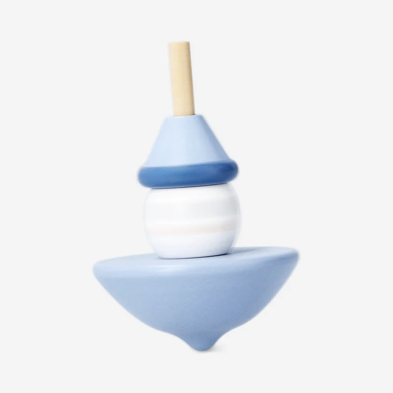 Wooden spinning top with snowman