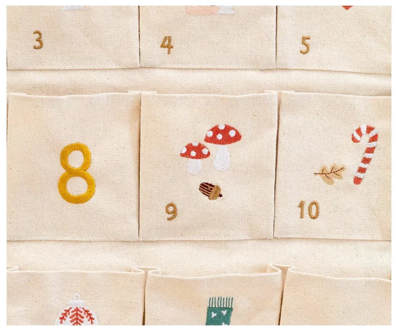 Calendario de adviento bordado · Monneka