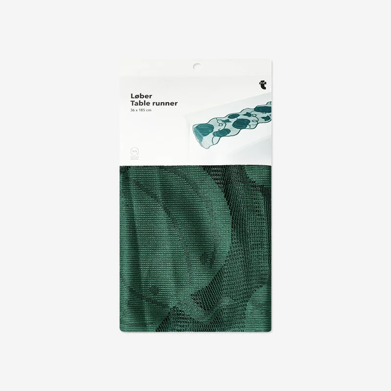 Green table runner with pumpkin print