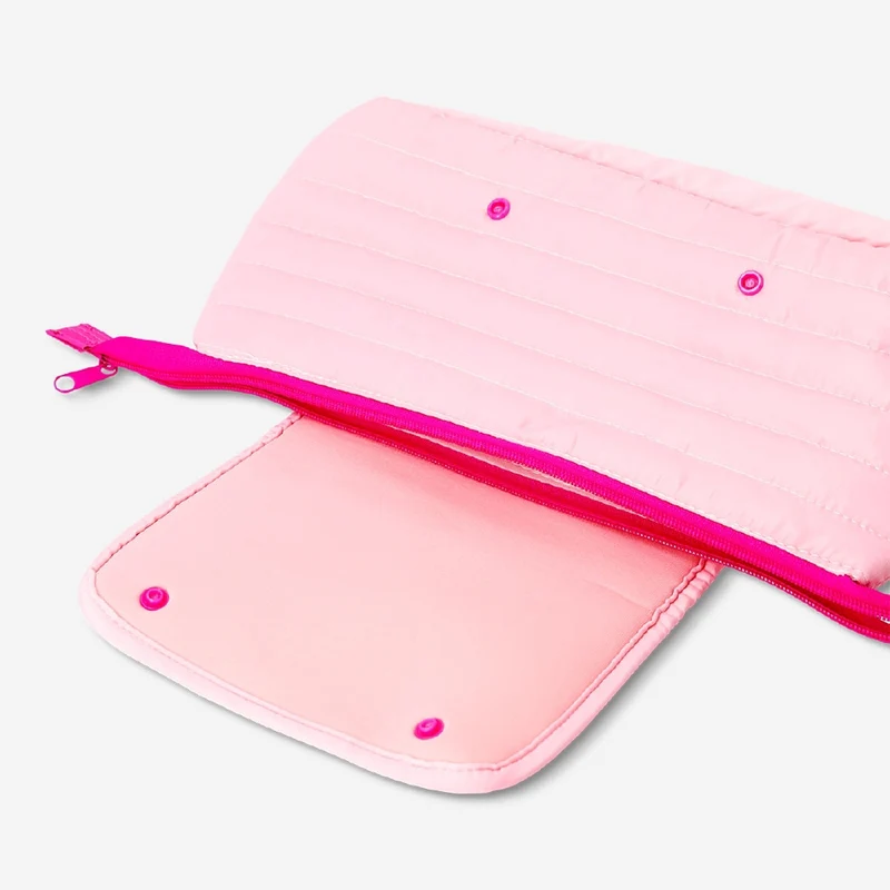 Pink organiser bag for hair styling tools