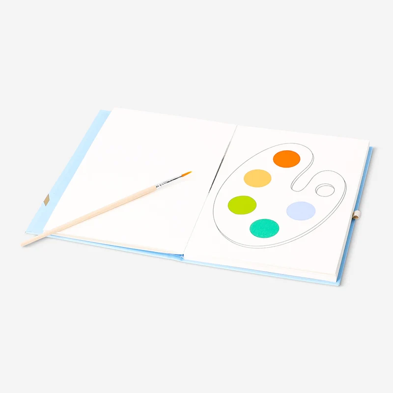 Watercolouring book with paint and brush