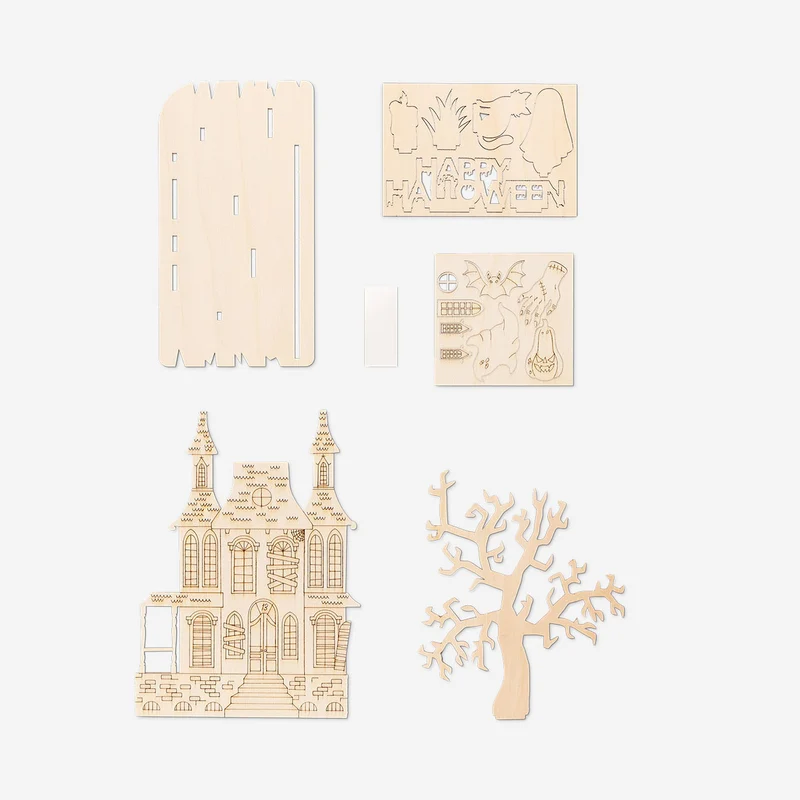 DIY haunted house with paint and brush