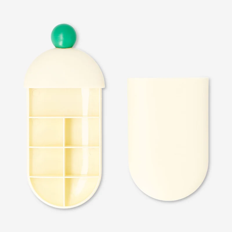Pill organiser with slide mechanism