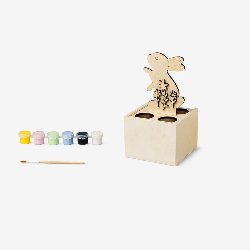 DIY egg stand with paint and brush